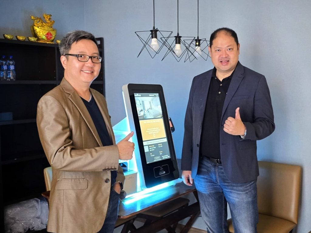 Guest using a shortstay self-check-in hotel kiosk for a fast and seamless arrival experience